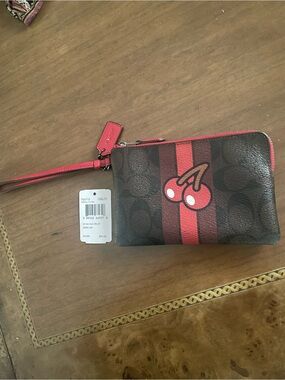 Coach x Pac-Man logo print coated Cherry Stripe Wristlet